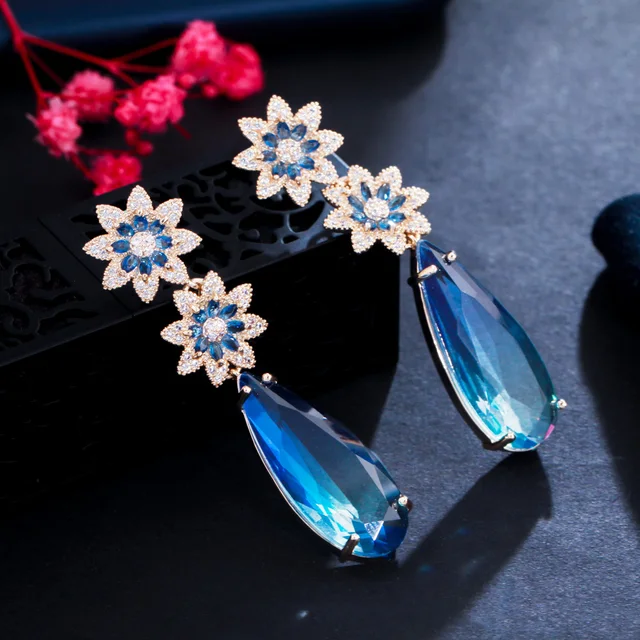 Blue flower dangling earrings