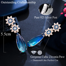 Load image into Gallery viewer, Blue flower dangling earrings
