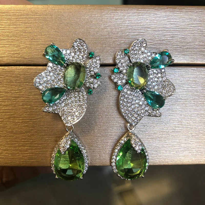 Green dangling earrings