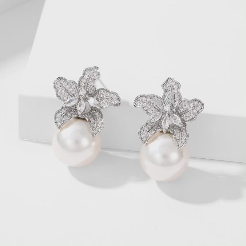 Elegant imitation big pearl stud brudal earrings, suitable for Brides and luxury events. AAA grade Zirconia .